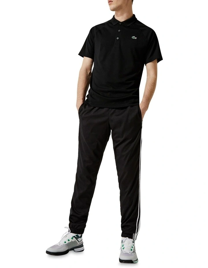 Lacoste Ultra Dry Solid Colour Polo In Black