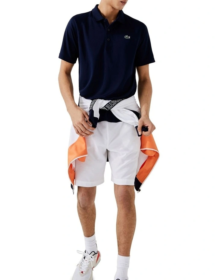 Lacoste Ultra Dry Solid Colour Polo In Navy Blue