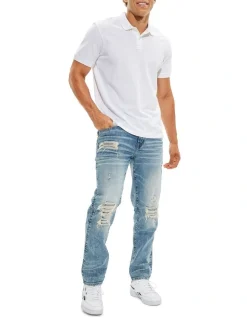 American Eagle AE AirFlex Patched Athletic Fit Jean In Cool Hand Blue
