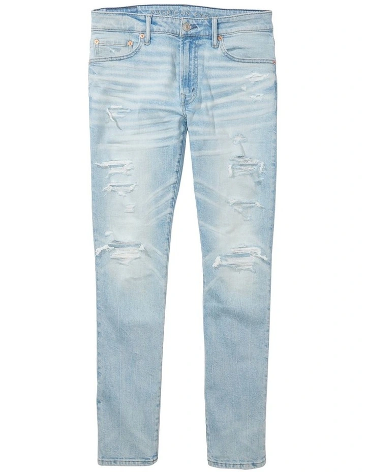 American Eagle AirFlex Patched Slim Jean In Light Destroy Wash In Blue 4 American Eagle AirFlex Patched Slim Jean In Light Destroy Wash In Blue - Image 4